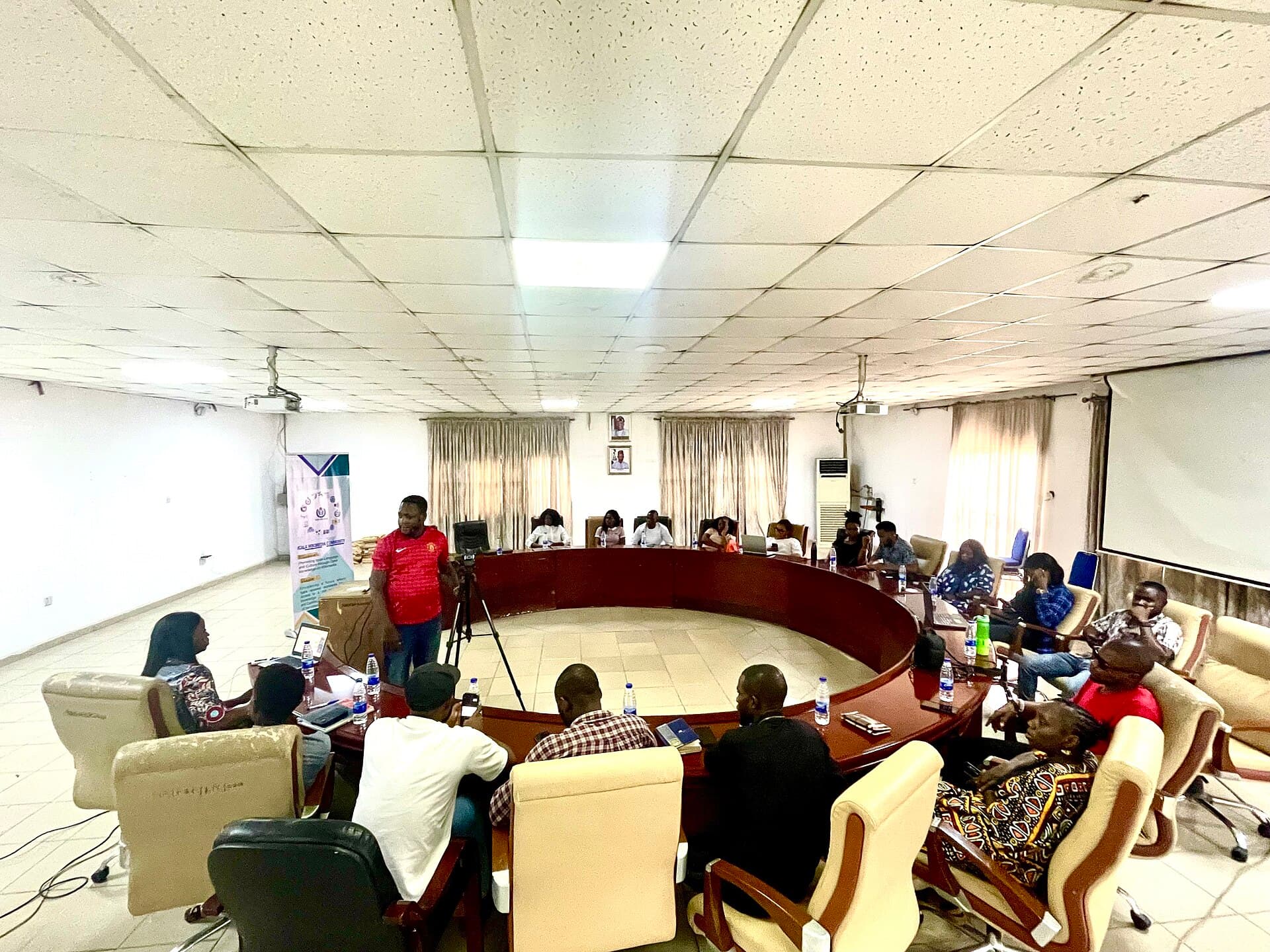 A Nigerian language revitalization community meeting in progress